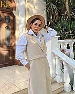 Sleeveless coat - Image 4